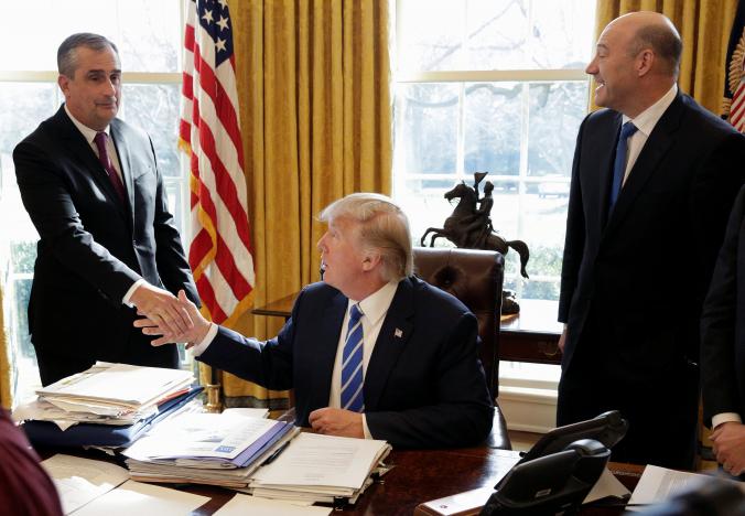U.S. President Donald Trump shakes hands with Chief Executive Officer of Intel Brian Krzanich the Oval Office of the White House in Washington, U.S., February 8, 2017.      REUTERS/Joshua Roberts
