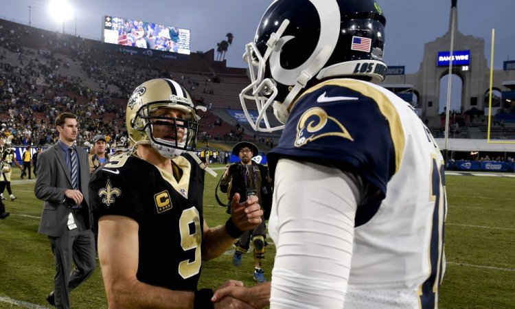 Los Angeles Rams quarterback Jared Goff, right, greets New Orleans Saints quarterback Drew Brees after their 26-20 win during an NFL football game Sunday, Nov. 26, 2017, in Los Angeles. (AP Photo/Kelvin Kuo)