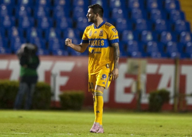 Tigres' Andre Pierre Gignac celebrates after scoring against Toluca during their Mexican Apertura 2020 football tournament repechage match at the Universitario stadium in Monterrey, Mexico, on November 22, 2020, amid the COVID-19 novel coronavirus pandemic. (Photo by Julio Cesar AGUILAR / AFP) (Photo by JULIO CESAR AGUILAR/AFP via Getty Images)