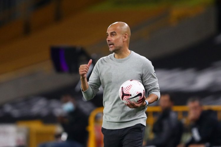 WOLVERHAMPTON, ENGLAND - SEPTEMBER 21: Pep Guardiola, Manager of Manchester City reacts during the Premier League match between Wolverhampton Wanderers and Manchester City at Molineux on September 21, 2020 in Wolverhampton, England. (Photo by Marc Atkins/Getty Images)
