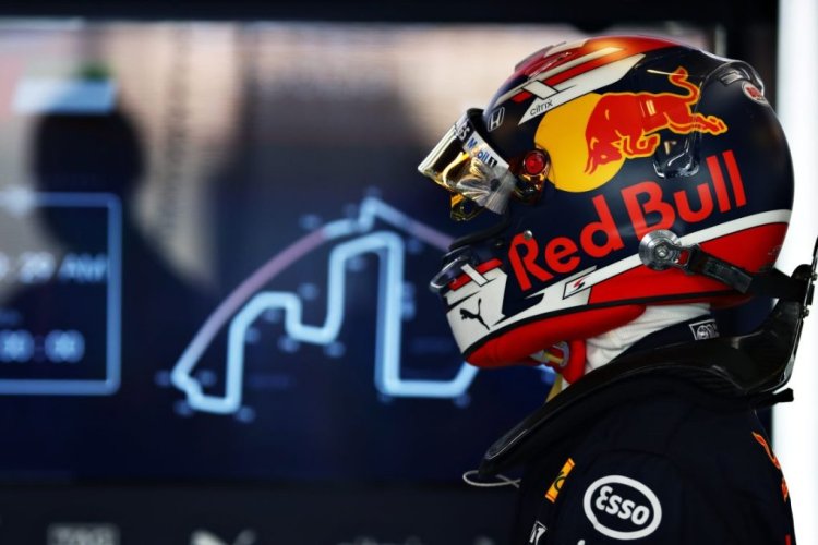 ABU DHABI, UNITED ARAB EMIRATES - DECEMBER 15: Sebastien Buemi of Switzerland and Red Bull Racing prepares to drive in the garage during the F1 Young Drivers Test at Yas Marina Circuit on December 15, 2020 in Abu Dhabi, United Arab Emirates. (Photo by Mark Thompson/Getty Images)