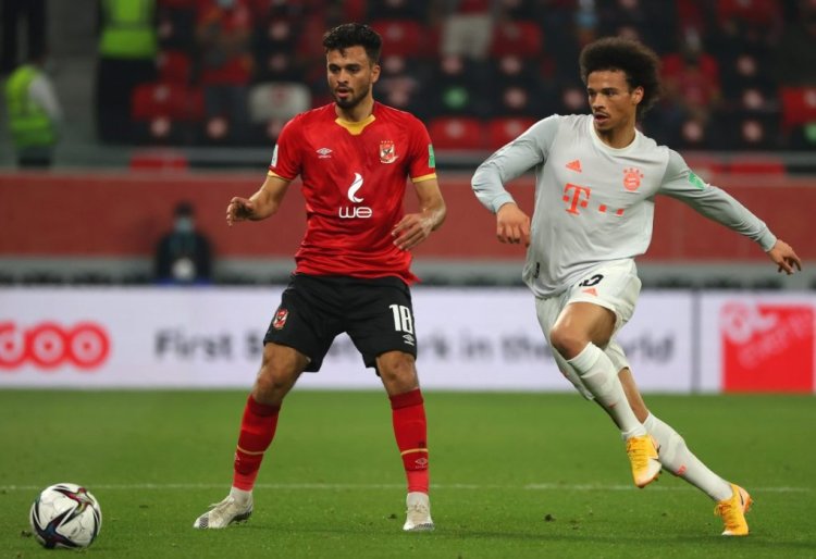 Ahly's forward Salah Mohsen (L) is closed down by Bayern Munich's German midfielder Leroy Sane during the FIFA Club World Cup semi-final football match between Egypt's Al-Ahly and Germany's Bayern Munich at the Ahmed bin Ali Stadium in the Qatari city of Ar-Rayyan on February 8, 2021. (Photo by Karim JAAFAR / AFP) (Photo by KARIM JAAFAR/AFP via Getty Images)