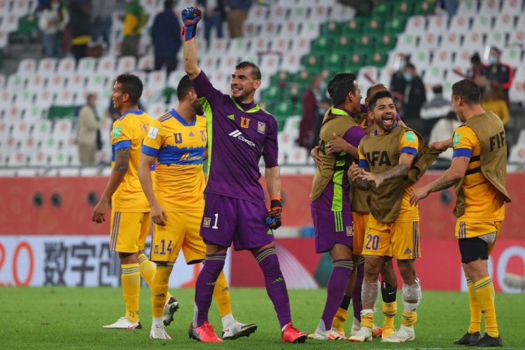 Tigres' players celebrate their win during the FIFA Club World Cup semi-final football match between Brazil's Palmeiras and Mexico's UANL Tigres at the Ahmed bin Ali Stadium in the Qatari city of Ar-Rayyan on February 7, 2021. (Photo by Karim JAAFAR / AFP) (Photo by KARIM JAAFAR/AFP via Getty Images)