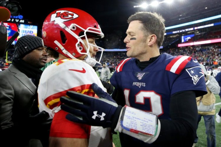 FOXBOROUGH, MASSACHUSETTS - DECEMBER 08: Tom Brady #12 of the New England Patriots talks with Patrick Mahomes #15 of the Kansas City Chiefs after the Chief defeat the Patriots 23-16 at Gillette Stadium on December 08, 2019 in Foxborough, Massachusetts. (Photo by Maddie Meyer/Getty Images)