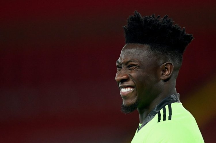 LIVERPOOL, ENGLAND - DECEMBER 01: Andre Onana of Ajax reacts during the UEFA Champions League Group D stage match between Liverpool FC and Ajax Amsterdam at Anfield on December 01, 2020 in Liverpool, England. Sporting stadiums around the UK remain under strict restrictions due to the Coronavirus Pandemic as Government social distancing laws prohibit fans inside venues resulting in games being played behind closed doors. (Photo by Michael Regan/Getty Images)