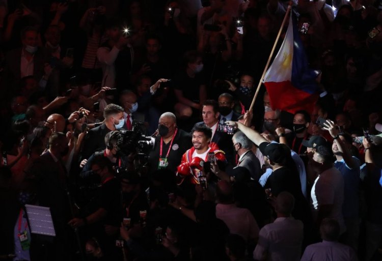 August 21, 2021, Las Vegas, Nevada, U.S: August 21, 2021 --- Yordenis Ugas defeats Manny Pacquiao pictured with a 12-round unanimous decision to win the WBA boxing world welterweight title ,Saturday at the T-Mobile Arena in Las Vegas. Las Vegas U.S. - ZUMAf136 20210821_zap_f136_012 Copyright: xChrisxFarinax