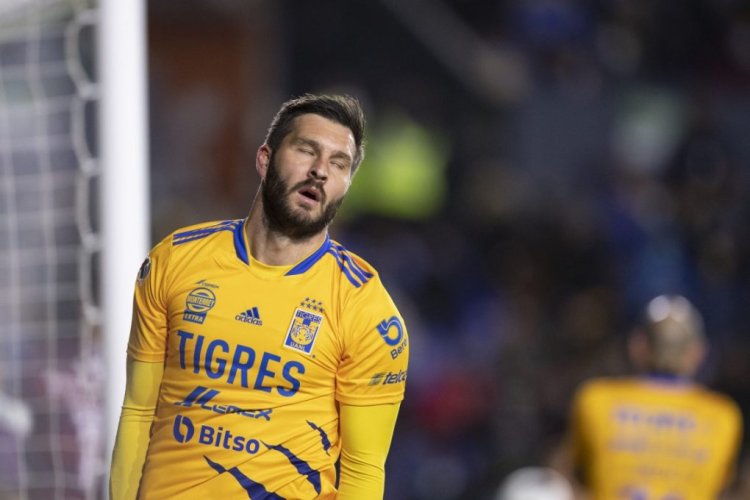 MONTERREY, MEXICO - JANUARY 15: Andre-Pierre Gignac #10 of Tigres reacts during the 2nd round match between Tigres UANL and Puebla as part of the Torneo Grita Mexico C22 at Universitario Stadium on January 15, 2022 in Monterrey, Mexico. (Photo by Azael Rodriguez/Getty Images)
