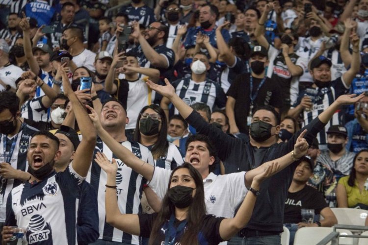Monterrey's fans cheer during the Mexican Clausura tournament football match between Monterrey and America at BBVA Bancomer stadium in Monterrey, Mexico, on March 5, 2022. (Photo by Julio Cesar AGUILAR / AFP) (Photo by JULIO CESAR AGUILAR/AFP via Getty Images)