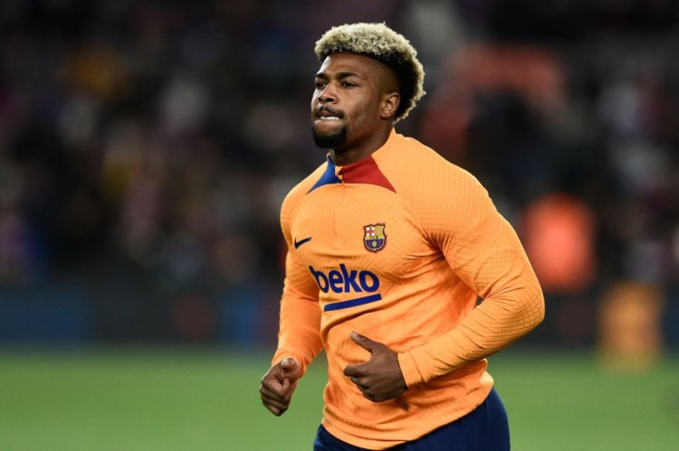 Barcelona's Spanish forward Adama Traore warms up prior to the Spanish league football match between FC Barcelona and CA Osasuna at the Camp Nou stadium in Barcelona on March 13, 2022. (Photo by Josep LAGO / AFP) (Photo by JOSEP LAGO/AFP via Getty Images)
