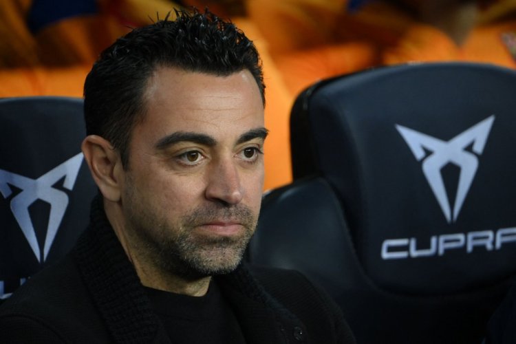 Barcelona's Spanish coach Xavi looks on prior to the Spanish league football match between FC Barcelona and Rayo Vallecano de Madrid at the Camp Nou stadium in Barcelona on April 24, 2022. (Photo by LLUIS GENE / AFP) (Photo by LLUIS GENE/AFP via Getty Images)