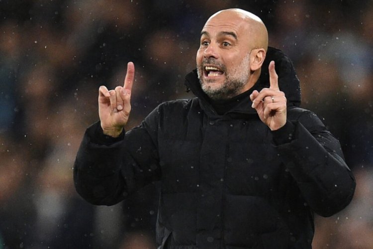 Manchester City's Spanish manager Pep Guardiola gestures on the touchline during the UEFA Champions League Quarter-final first leg football match between Manchester City and Atletico Madrid at the Etihad Stadium in Manchester, north west England, on April 5, 2022. (Photo by Oli SCARFF / AFP) (Photo by OLI SCARFF/AFP via Getty Images)