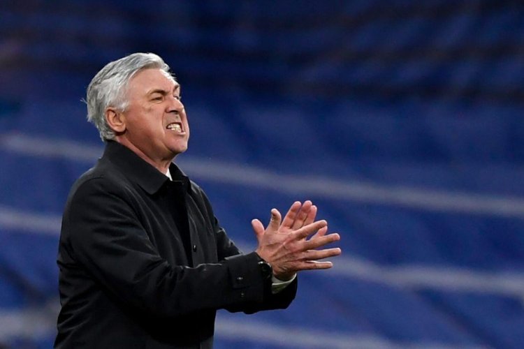Real Madrid's Italian coach Carlo Ancelotti reacts during the UEFA Champions League quarter final second leg football match between Real Madrid CF and Chelsea FC at the Santiago Bernabeu stadium in Madrid on April 12, 2022. (Photo by OSCAR DEL POZO / AFP) (Photo by OSCAR DEL POZO/AFP via Getty Images)