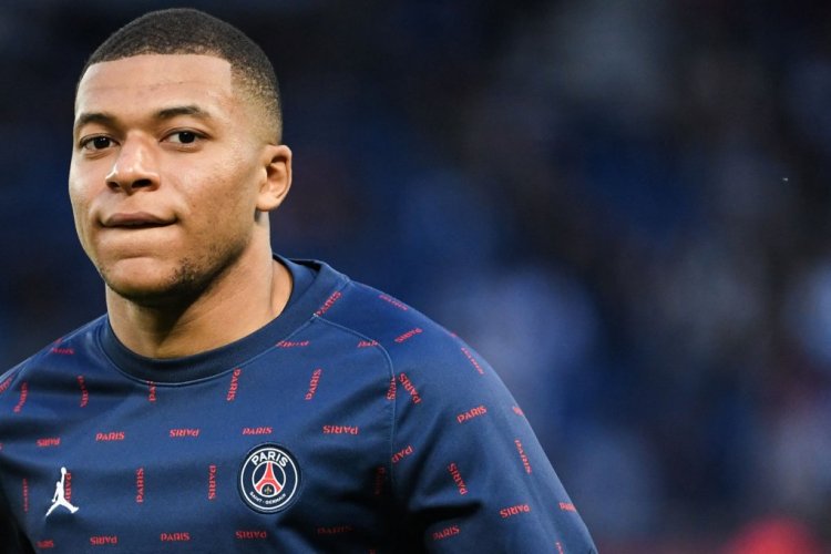 Paris Saint-Germain's French forward Kylian Mbappe looks on ahead of the French L1 football match between Paris-Saint Germain (PSG) and Lens (RCL) at The Parc des Princes Stadium in Paris on April 23, 2022. (Photo by bERTRAND GUAY / AFP) (Photo by BERTRAND GUAY/AFP via Getty Images)