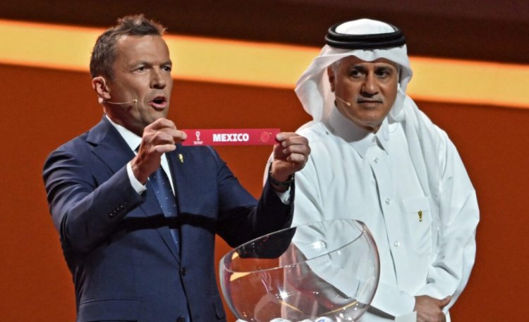 Former German footballer Lothar Matthaus holds the card showing the name of Mexico during the draw for the 2022 World Cup in Qatar at the Doha Exhibition and Convention Center on April 1, 2022. (Photo by François-Xavier MARIT / AFP) (Photo by FRANCOIS-XAVIER MARIT/AFP via Getty Images)