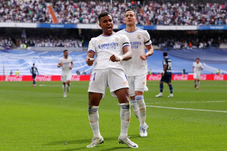 MADRID, SPAIN - APRIL 30: Rodrygo of Real Madrid celebrates with teammate Lucas Vazquez after scoring their team's second goal during the LaLiga Santander match between Real Madrid CF and RCD Espanyol at Estadio Santiago Bernabeu on April 30, 2022 in Madrid, Spain. (Photo by Gonzalo Arroyo Moreno/Getty Images)
