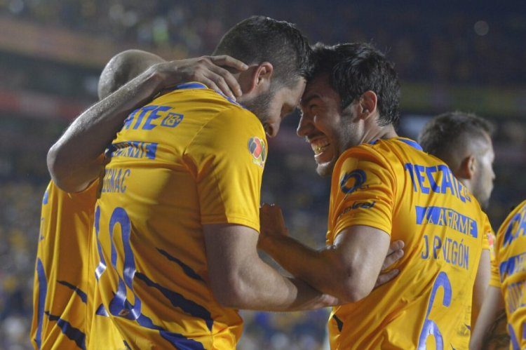 MONTERREY, MEXICO - APRIL 03: Andre-Pierre Gignac of Tigres celebrates with teammates after scoring his team's second goal during the 12th round match between Tigres UANL and Club Tijuana as part of the Torneo Grita Mexico C22 Liga MX at Universitario Stadium on April 03, 2022 in Monterrey, Mexico. (Photo by Azael Rodriguez/Getty Images)