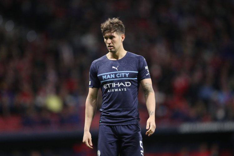 MADRID, SPAIN - APRIL 13: John Stones of Manchester City FC in action during the UEFA Champions League Quarter Final Leg Two match between Atletico Madrid and Manchester City at Wanda Metropolitano on April 13, 2022 in Madrid, Spain. (Photo by Gonzalo Arroyo Moreno/Getty Images)