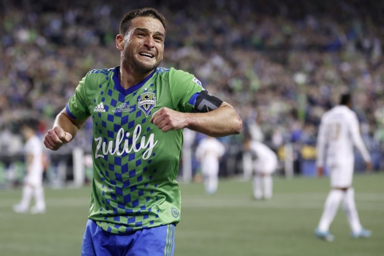 SEATTLE, WASHINGTON - MAY 04: Nicolás Lodeiro #10 of Seattle Sounders celebrates a goal by Raúl Ruidíaz #9 in the second half against Pumas during 2022 Scotiabank Concacaf Champions League Final Leg 2 at Lumen Field on May 04, 2022 in Seattle, Washington. (Photo by Steph Chambers/Getty Images)