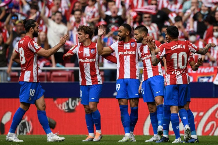 Atletico Madrid's Belgian midfielder Yannick Ferreira-Carrasco (3rd-R) celebrates with teammates after scoring his team's first goal during the Spanish League football match between Club Atletico de Madrid and RCD Espanyol at the Wanda Metropolitano stadium in Madrid on April 17, 2022. (Photo by OSCAR DEL POZO / AFP) (Photo by OSCAR DEL POZO/AFP via Getty Images)