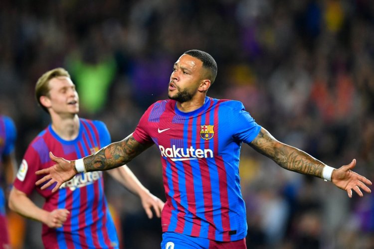 Barcelona's Dutch forward Memphis Depay celebrates scoring the opening goal during the Spanish League football match between FC Barcelona and RCD Mallorca at the Camp Nou stadium in Barcelona on May 1, 2022. (Photo by Pau BARRENA / AFP) (Photo by PAU BARRENA/AFP via Getty Images)