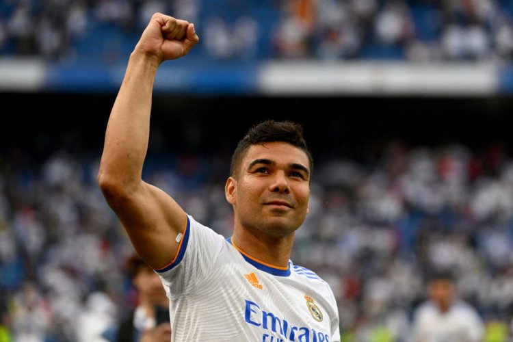 Real Madrid's Brazilian midfielder Casemiro celebrates at the end of the Spanish League football match between Real Madrid CF and RCD Espanyol at the Santiago Bernabeu stadium in Madrid on April 30, 2022. - Real Madrid secured a 35th La Liga title with four games to spare after a 4-0 home win over Espanyol that included two goals from Rodrygo. Needing just one point to clinch the trophy, Madrid struck twice through the Brazilian in the first half at the Santiago Bernabeu before further goals from Marco Asensio and Karim Benzema. (Photo by GABRIEL BOUYS / AFP) (Photo by GABRIEL BOUYS/AFP via Getty Images)