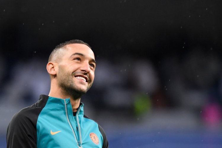 Chelsea's Moroccan midfielder Hakim Ziyech smiles during a warm up prior to the UEFA Champions League quarter final second leg football match between Real Madrid CF and Chelsea FC at the Santiago Bernabeu stadium in Madrid on April 12, 2022. (Photo by OSCAR DEL POZO / AFP) (Photo by OSCAR DEL POZO/AFP via Getty Images)
