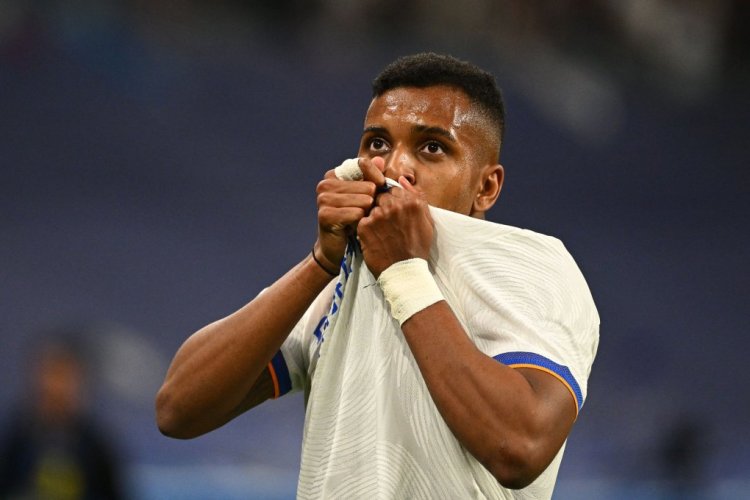Real Madrid's Brazilian forward Rodrygo celebrates after scoring a goal during the UEFA Champions League semi-final second leg football match between Real Madrid CF and Manchester City at the Santiago Bernabeu stadium in Madrid on May 4, 2022. (Photo by GABRIEL BOUYS / AFP) (Photo by GABRIEL BOUYS/AFP via Getty Images)