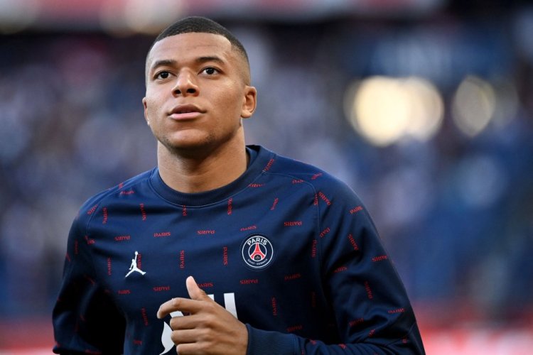 Paris Saint-Germain's French forward Kylian Mbappe warms up before the French L1 football match between Paris Saint-Germain (PSG) and Metz at the Parc des Princes stadium in Paris on May 21, 2022. (Photo by Anne-Christine POUJOULAT / AFP) (Photo by ANNE-CHRISTINE POUJOULAT/AFP via Getty Images)
