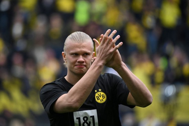 Dortmund's Norwegian forward Erling Braut Haaland cheers his fans as he warms up prior the German first division Bundesliga football match between Borussia Dortmund and VfL Bochum in Dortmund, western Germany on April 30, 2022. - DFL REGULATIONS PROHIBIT ANY USE OF PHOTOGRAPHS AS IMAGE SEQUENCES AND/OR QUASI-VIDEO (Photo by INA FASSBENDER / AFP) / DFL REGULATIONS PROHIBIT ANY USE OF PHOTOGRAPHS AS IMAGE SEQUENCES AND/OR QUASI-VIDEO (Photo by INA FASSBENDER/AFP via Getty Images)