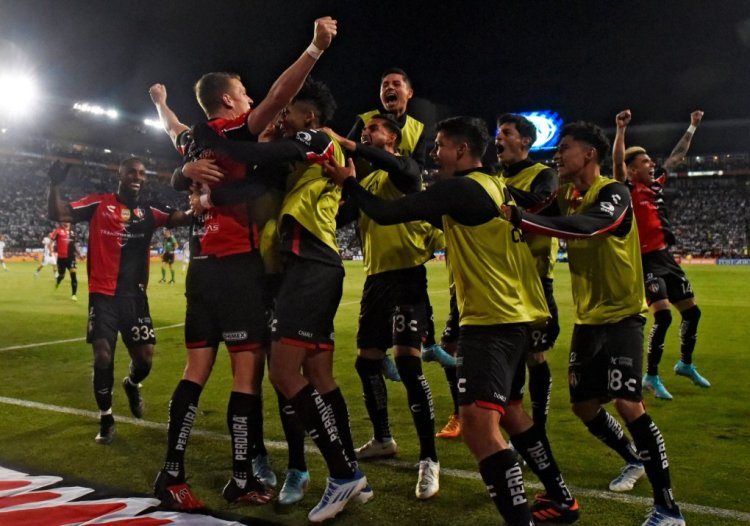 Julio Furch (2-L) of Atlas celebrates with teammates after scoring a goal against Pachuca during their Mexican Clausura 2022 tournament final football match at the Hidalgo stadium in Pachuca, Hidalgo State, Mexico, on May 29, 2022. (Photo by CLAUDIO CRUZ / AFP) (Photo by CLAUDIO CRUZ/AFP via Getty Images)
