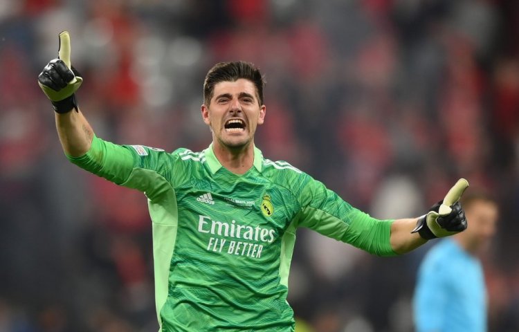 PARIS, FRANCE - MAY 28:  Thibaut Courtois of Real Madrid celebrates following their sides victory in the UEFA Champions League final match between Liverpool FC and Real Madrid at Stade de France on May 28, 2022 in Paris, France. (Photo by Shaun Botterill/Getty Images)
