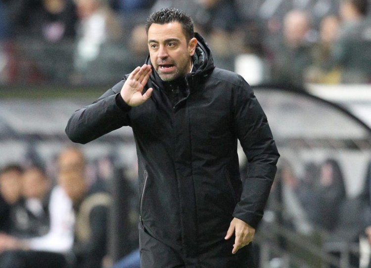 TOPSHOT - Barcelona's Spanish coach Xavi reacts from the sidelines during the UEFA Europa League quarter-final, first-leg football match Eintracht Frankfurt v FC Barcelona in Frankfurt, western Germany on April 7, 2022. -  (Photo by Daniel ROLAND / AFP) (Photo by DANIEL ROLAND/AFP via Getty Images)
