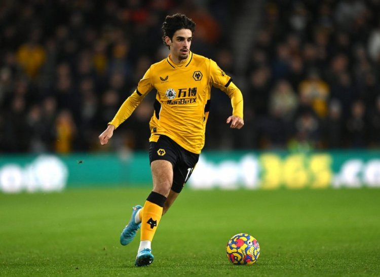 WOLVERHAMPTON, ENGLAND - FEBRUARY 10:  Francisco Trincao of Wolverhampton Wanderers runs with the ball during the Premier League match between Wolverhampton Wanderers  and  Arsenal at Molineux on February 10, 2022 in Wolverhampton, England. (Photo by Shaun Botterill/Getty Images)