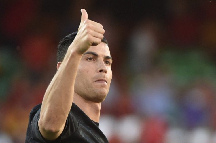 Portugal's forward Cristiano Ronaldo gives a thumb-up as he warms up prior to the UEFA Nations League, league A group 2 football match between Spain and Portugal, at the Benito Villamarin stadium in Seville on June 2, 2022. (Photo by CRISTINA QUICLER / AFP) (Photo by CRISTINA QUICLER/AFP via Getty Images)