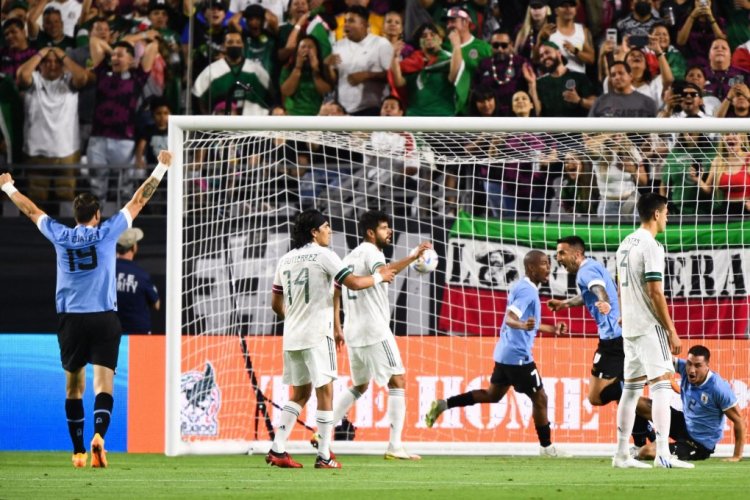 Uruguay's midfielder Matias Vecino (3rd R) celebrates after scoring against Mexico during an international friendly football match between Mexico and Uruguay at State Farm Stadium in Glendale, Arizona on June 2, 2022. (Photo by Patrick T. FALLON / AFP) (Photo by PATRICK T. FALLON/AFP via Getty Images)