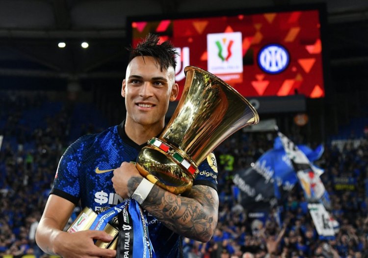 Inter Milan's Argentine forward Lautaro Martinez celebrates with the winner's trophy after Inter won the Italian Cup (Coppa Italia) final football match between Juventus and Inter on May 11, 2022 at the Olympic stadium in Rome. (Photo by Isabella BONOTTO / AFP) (Photo by ISABELLA BONOTTO/AFP via Getty Images)
