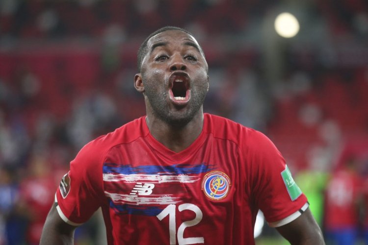 Costa Rica's forward Joel Campbell celebrates with the fans after winning the FIFA World Cup 2022 inter-confederation play-offs match between Costa Rica and New Zealand on June 14, 2022, at the Ahmed bin Ali Stadium in the Qatari city of Ar-Rayyan. - Costa Rica beat New Zealand 1-0 to claim the last spot at this year's World Cup finals. Joel Campbell scored the only goal in the third minute. (Photo by MUSTAFA ABUMUNES / AFP) (Photo by MUSTAFA ABUMUNES/AFP via Getty Images)