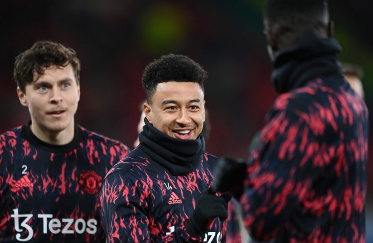 MANCHESTER, ENGLAND - MARCH 15: Jesse Lingard of Manchester United warms up prior to the UEFA Champions League Round Of Sixteen Leg Two match between Manchester United and Atletico Madrid at Old Trafford on March 15, 2022 in Manchester, England. (Photo by Michael Regan/Getty Images)