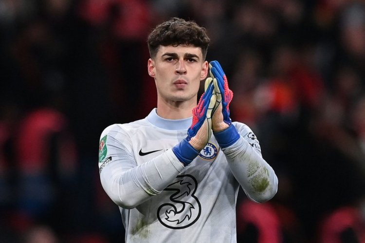 Chelsea's Spanish goalkeeper Kepa Arrizabalaga applauds the fans after a penalty shoot-out during the English League Cup final football match between Chelsea and Liverpool at Wembley Stadium, north-west London on February 27, 2022. - Liverpool won the match 11-10 on penalties after extra time. - RESTRICTED TO EDITORIAL USE. No use with unauthorized audio, video, data, fixture lists, club/league logos or 'live' services. Online in-match use limited to 120 images. An additional 40 images may be used in extra time. No video emulation. Social media in-match use limited to 120 images. An additional 40 images may be used in extra time. No use in betting publications, games or single club/league/player publications. (Photo by Glyn KIRK / AFP) / RESTRICTED TO EDITORIAL USE. No use with unauthorized audio, video, data, fixture lists, club/league logos or 'live' services. Online in-match use limited to 120 images. An additional 40 images may be used in extra time. No video emulation. Social media in-match use limited to 120 images. An additional 40 images may be used in extra time. No use in betting publications, games or single club/league/player publications. / RESTRICTED TO EDITORIAL USE. No use with unauthorized audio, video, data, fixture lists, club/league logos or 'live' services. Online in-match use limited to 120 images. An additional 40 images may be used in extra time. No video emulation. Social media in-match use limited to 120 images. An additional 40 images may be used in extra time. No use in betting publications, games or single club/league/player publications. (Photo by GLYN KIRK/AFP via Getty Images)