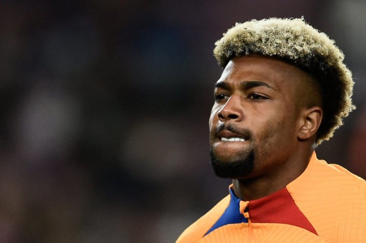 Barcelona's Spanish forward Adama Traore grimaces as he warms up prior to the Spanish league football match between FC Barcelona and CA Osasuna at the Camp Nou stadium in Barcelona on March 13, 2022. (Photo by Josep LAGO / AFP) (Photo by JOSEP LAGO/AFP via Getty Images)