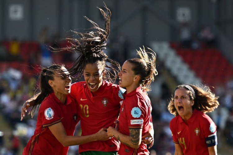 Portugal's striker Jessica Silva celebrates scoring her team's second goal with teammates during the UEFA Women's Euro 2022 Group C football match between Portugal and Switzerland at Leigh Sports Village stadium in north-west England on July 9, 2022. - No use as moving pictures or quasi-video streaming. 
Photos must therefore be posted with an interval of at least 20 seconds. (Photo by Oli SCARFF / AFP) / No use as moving pictures or quasi-video streaming. 
Photos must therefore be posted with an interval of at least 20 seconds. (Photo by OLI SCARFF/AFP via Getty Images)