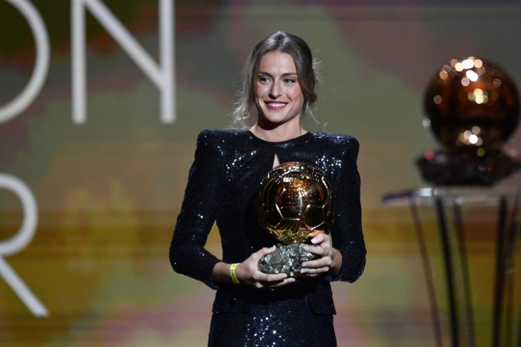 PARIS, FRANCE - NOVEMBER 29: Alexia Putellas (FC Barcelona) is awarded with the Ballon D'Or Trophy during the Ballon D'Or ceremony at Theatre du Chateleton November 29, 2021 in Paris, France. (Photo by Aurelien Meunier/Getty Images)