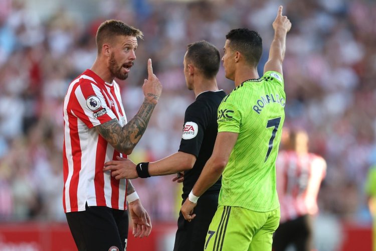 BRENTFORD, ENGLAND - AUGUST 13: Pontus Jansson of Brentford interacts with Cristiano Ronaldo of Manchester United during the Premier League match between Brentford FC and Manchester United at Brentford Community Stadium on August 13, 2022 in Brentford, England. (Photo by Catherine Ivill/Getty Images)