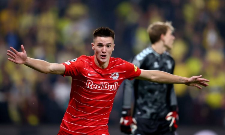 COPENHAGEN, DENMARK - AUGUST 25: Benjamin Sesko of FC Red Bull Salzburg celebrates after he scores his team's opening goal during the UEFA Champions League Play-Offs Leg Two match between Brondby IF and FC Red Bull Salzburg at  on August 25, 2021 in Copenhagen, Denmark. (Photo by Martin Rose/Getty Images)