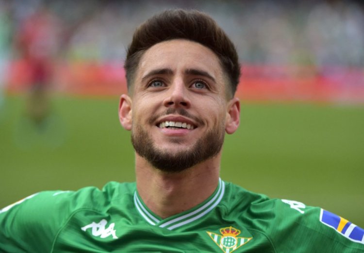 Real Betis' Spanish defender Alex Moreno celebrates scoring his team's fourth goal during the Spanish League football match between Real Betis and CA Osasuna at the Benito Villamarin stadium in Seville on April 3, 2022. (Photo by CRISTINA QUICLER / AFP) (Photo by CRISTINA QUICLER/AFP via Getty Images)