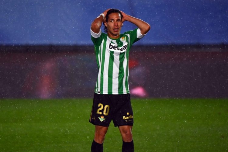 Real Betis' Mexican midfielder Diego Lainez puts his hands on his head during the Spanish League football match between Real Madrid CF and Real Betis at the Alfredo di Stefano stadium in Valdebebas, on the outskirts of Madrid, on April 24, 2021. (Photo by GABRIEL BOUYS / AFP) (Photo by GABRIEL BOUYS/AFP via Getty Images)