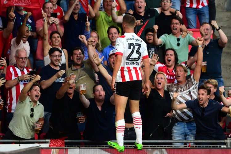 PSV Eindhoven's Dutch midfielder Joey Veerman (C) celebrates with supporters after scoring his team's first goal during the UEFA Champions League third qualifying round second leg football match between PSV Eindhoven and AS Monaco at the "Phillips Stadium" in Eindhoven on August 9, 2022. - - Netherlands OUT (Photo by Olaf Kraak / ANP / AFP) / Netherlands OUT (Photo by OLAF KRAAK/ANP/AFP via Getty Images)