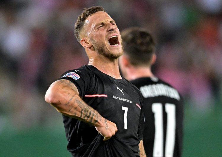 Austria's striker Marko Arnautovic (L) reacts during the UEFA Nations League football match between Austria and Denmark at the Ernst Happel stadium in Vienna, Austria on June 6, 2022. (Photo by JOE KLAMAR / AFP) (Photo by JOE KLAMAR/AFP via Getty Images)