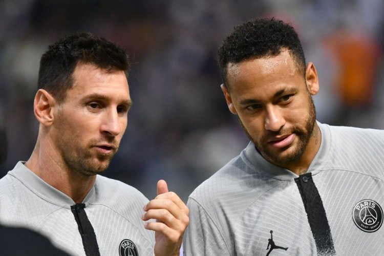 Paris Saint-Germain's Brazilian forward Neymar (R) chats with his teammate Argentinian forward Lionel Messi (L) prior to their PSG's Japan Tour football match against Gamba Osaka at Suita stadium in Osaka on July 25, 2022. (Photo by Kazuhiro NOGI / AFP) (Photo by KAZUHIRO NOGI/AFP via Getty Images)