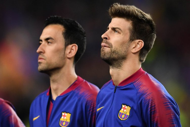 BARCELONA, SPAIN - APRIL 16: Sergio Busquets and Gerard Pique of FC Barcelona looks on during the UEFA Champions League Quarter Final second leg match between FC Barcelona and Manchester United at Camp Nou on April 16, 2019 in Barcelona, Spain. (Photo by David Ramos/Getty Images)